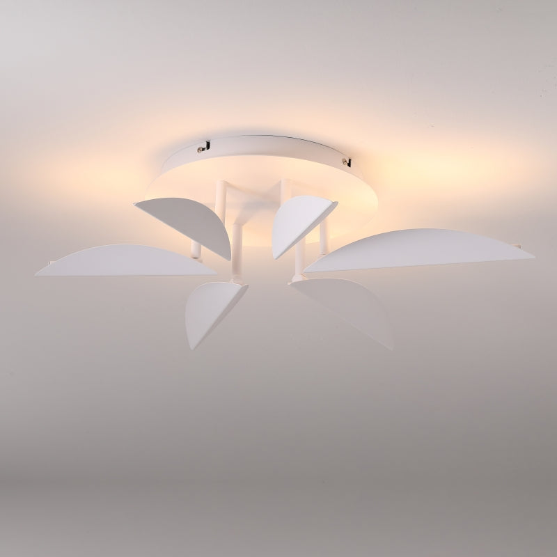Modern LED ceiling light fixture with white leaves on a neutral background